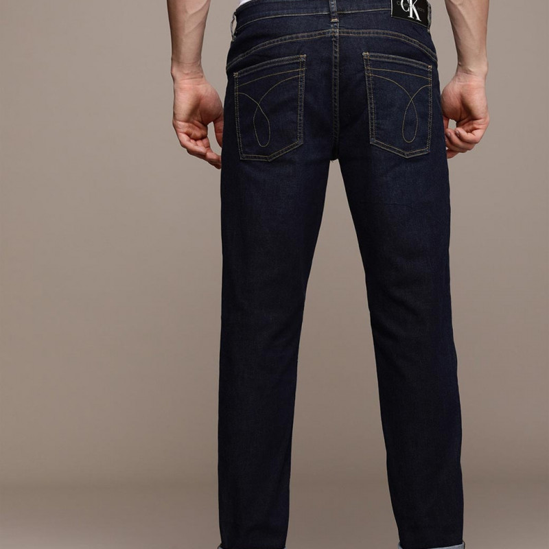 Men Navy Blue Body Tapered Fit Mid-Rise Light Fade Stretchable Jeans